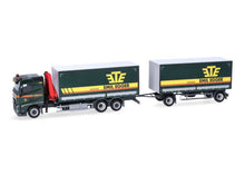 Lade das Bild in den Galerie-Viewer, Volvo FH 2020 Flachdach Planen Hängerzug mit Kran Emil Egger 1:87
