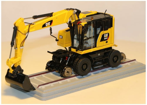 Cat M323F Railroad Wheel Excavator - Safety Yellow